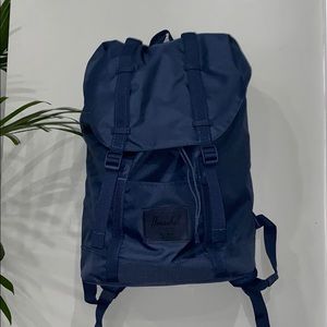 Herschel Navy Blue Back Pack.